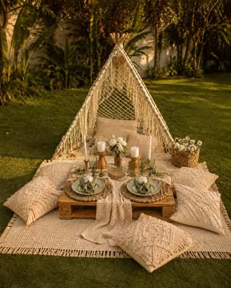 Prelude setup under a macramé tent in daylight