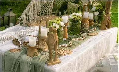 Sage green theme: table with candles and greenery