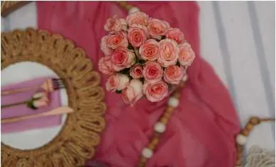 Blush pink theme: roses on a pink runner